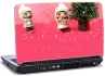 laptop skin med 2 dukker i snevejr