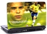 Braziliensk fodboldspiller Ronaldo som dribler med fodbolden Braziliensk fodboldspiller Ronaldo som dribler med fodbolden